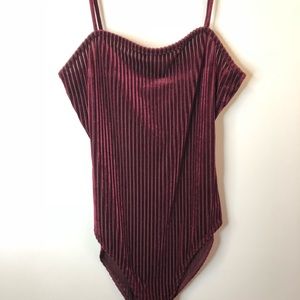 Purple velvet body suit